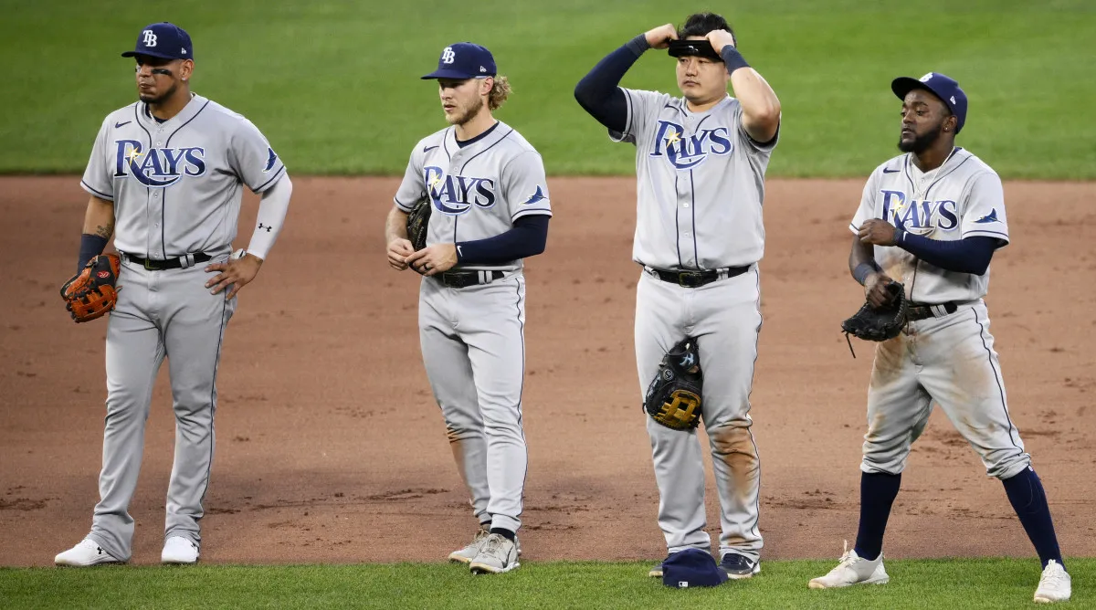 Rays players look on as the team loses in the 2022 playoffs.