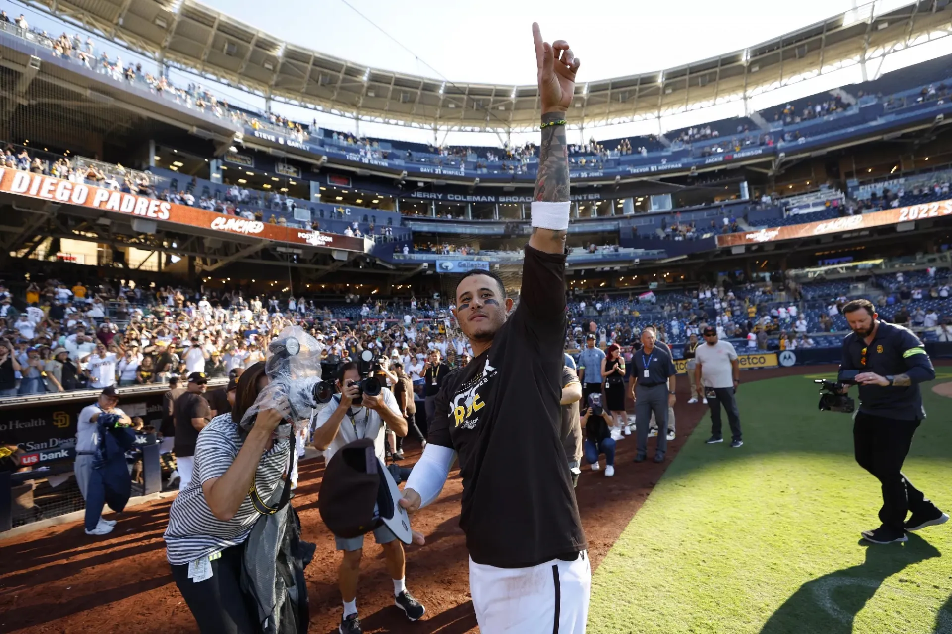 Manny Machado celebrates after the San Diego Padres clinched a playoff berth. 